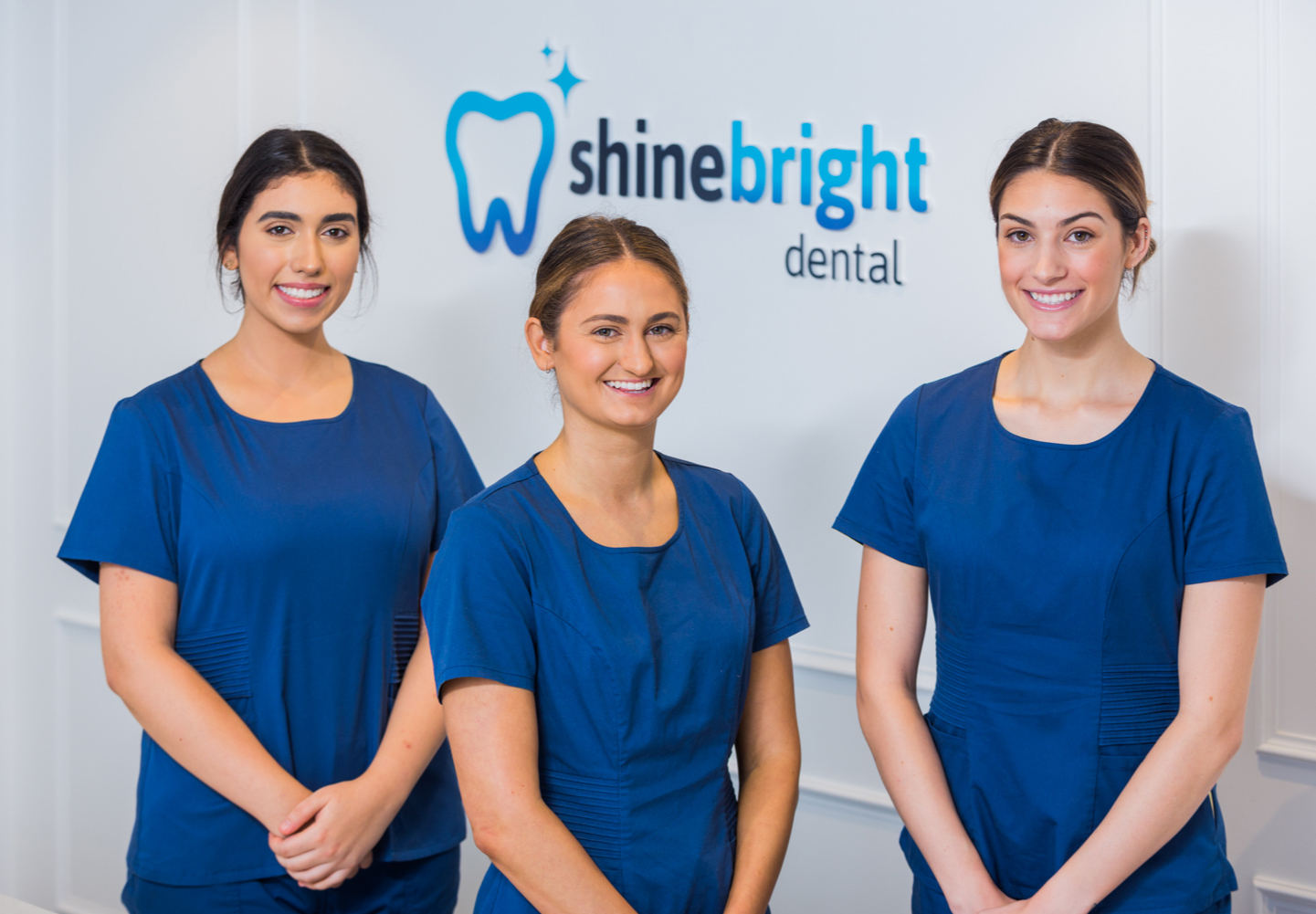 Image of people working on the Shine Bright Dental