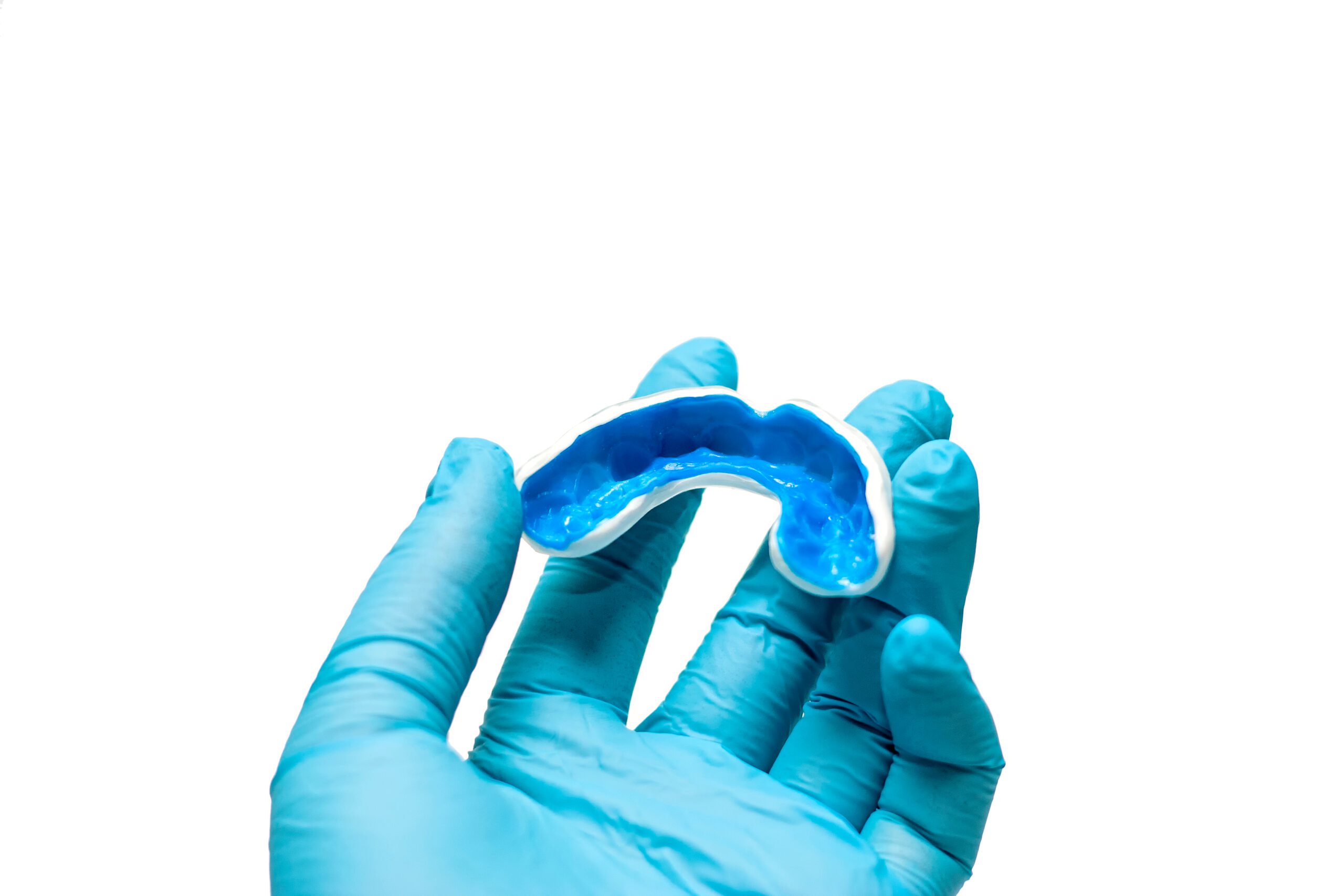 A white custom mouthguard for contact sports